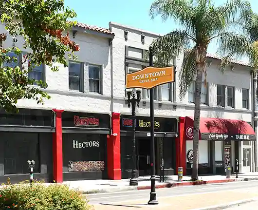 Appliance repair Santa Ana – downtown street view with stores and sign saying Downtown Santa Ana