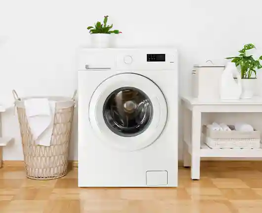 Appliance repair Santa Ana – cozy bathroom with washing machine and laundry basket