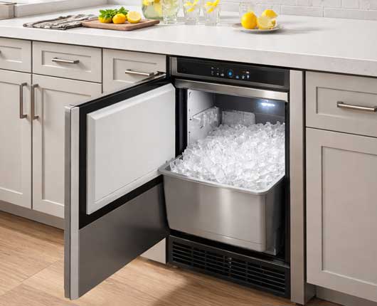 Built-in ice maker inside a modern home kitchen representing appliance repair near me for everyday household use