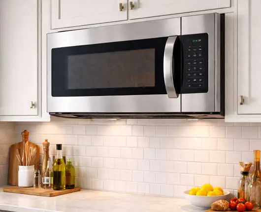 Built-in microwave in modern home kitchen interior → appliance repair near me