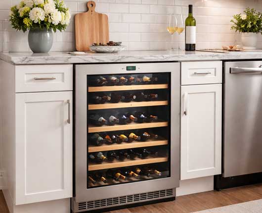 Built-in wine cooler inside a modern kitchen representing appliance repair near me for household appliances